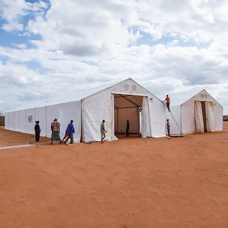 Aonaid Stórála Soghluaiste Phuball 10 × 24m IFRC/ICRC/WFP/IOM (MSU)